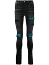 Amiri Mx1 Cracked Paint Skinny Jeans In Schwarz