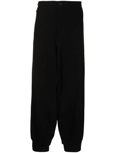 Yohji Yamamoto Tapered-leg Cotton Trousers In Black