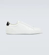 Common Projects Round-toe Low-top Leather Sneaker With Flat Sole In White/black