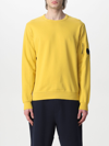 C.p. Company Logo Plaque Crewneck Sweatshirt In Gold