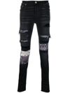 AMIRI BANDANA-PRINT SKINNY JEANS