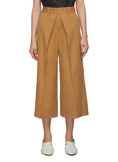 Jw Anderson Pleat Front Detail Wide Leg Cropped Trousers In Brown