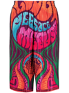 Versace Pleated Medusa Music Print Shorts In Orange