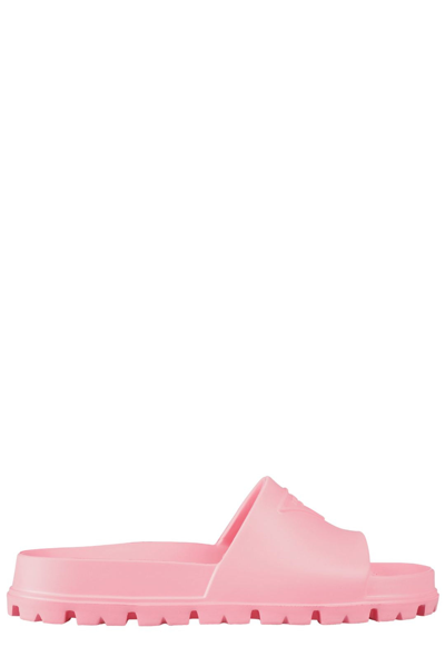 Prada Triangle Embossed-logo Lug-sole Slides In Pink & Purple