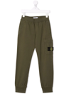 Stone Island Logo Patch Tracksuit Bottoms In Green