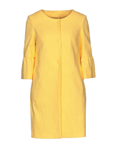 Annie P Overcoats In Yellow