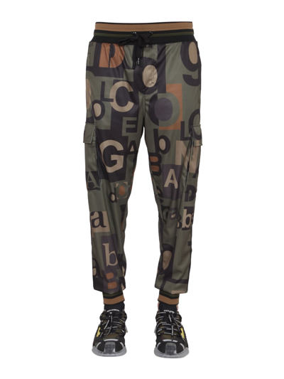 Dolce & Gabbana Jogging Pants With All-over Logo Print In Verde