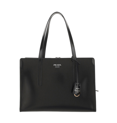 Prada Logo Detailed Zipped Tote Bag In Black