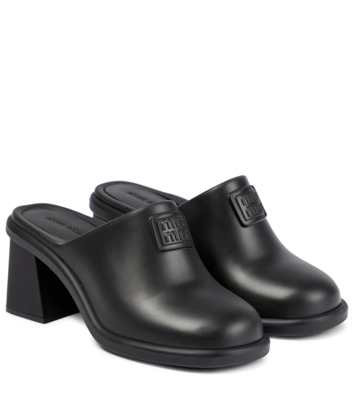 Miu Miu Logo Rubber Clogs In Nero