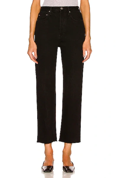 Totême Straight Leg Frayed Hem Classic Cut Denim Jeans In Black