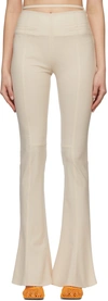 Jacquemus Tangelo Pleated Stretch-wool Flared Pants In 110 Off-white