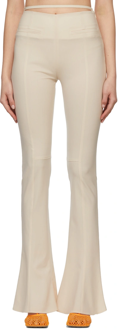 Jacquemus Le Trouser Tangelo Flared High-rise Stretch-wool Trousers In Off-white
