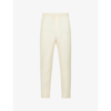 Issey Miyake Pleated Relaxed-fit Tapered Woven Trousers In Vanilla Beige