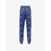 Amiri Tapered Bandana-jacquard Cotton And Cashmere-blend Sweatpants In Blue Black