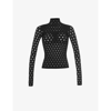 Maisie Wilen Perforated Turtleneck Stretch-jersey Top In Black