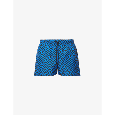 Versace La Greca Monogram-print Swim Shorts In Sapphire+black