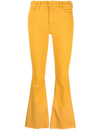 Mother Cropped Flared Jeans In Yellow
