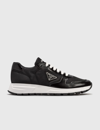 Prada Prax 1 Sneakers In Re-nylon And Brushed Leather In Black