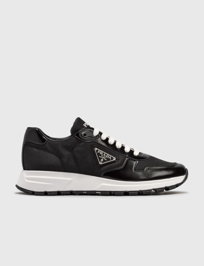 Prada Prax 1 Trainers In Re-nylon And Brushed Leather In Black