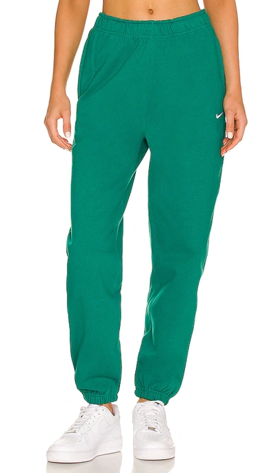 Nike Women's Solo Swoosh Fleece Pants In Green