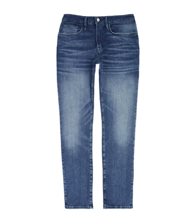 Frame Skinny-fit Faded Whiskered Denim Jeans In Blue