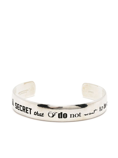 Undercover Slogan Engraved Cuff In Silver