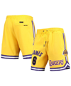 PRO STANDARD MEN'S PRO STANDARD LEBRON JAMES GOLD LOS ANGELES LAKERS PLAYER REPLICA SHORTS