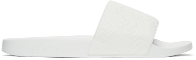 Gucci Gg-embossed Rubber Slides In White