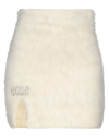 Gcds Mini Skirts In Ivory