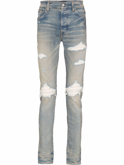 Amiri Light Blue Skinny Jeans With Camouflage Patches