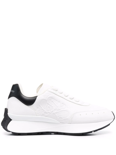 Alexander Mcqueen Exaggerated-sole Logo-embossed Leather Trainers In White