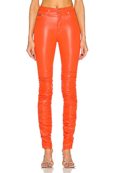Dolce & Gabbana Coated-cotton Trousers In Orange