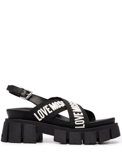 Love Moschino Crossover Logo Strap Sandals In Black