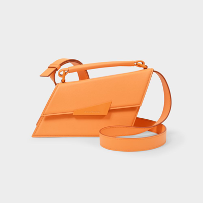Acne Studios Agost Asymmetric Leather Shoulder Bag In Orange