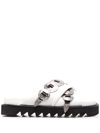 TOGA BUCKLE-DETAIL CROSSOVER-STRAP SANDALS