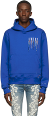 Amiri Paint Splatter Logo-embroidered Hoodie In Blue