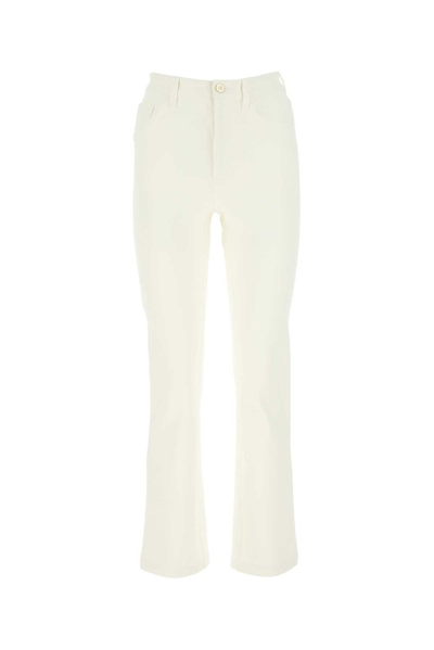 Fendi Logo Embossed Slim Leg Jeans In White
