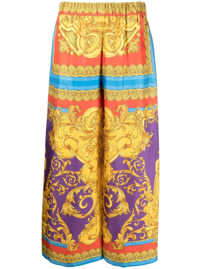 Versace Cropped Printed Silk-satin Wide-leg Trousers In Orange,gold,blue