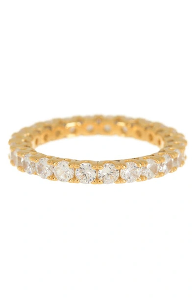 Suzy Levian Gold Plated Sterling Silver Cz Round Cut Eternity Band Ring In Yellow