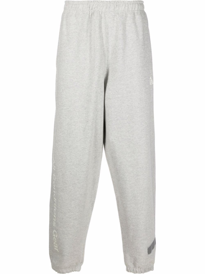 NIKE AURORA LOGO-PRINT SWEATPANTS