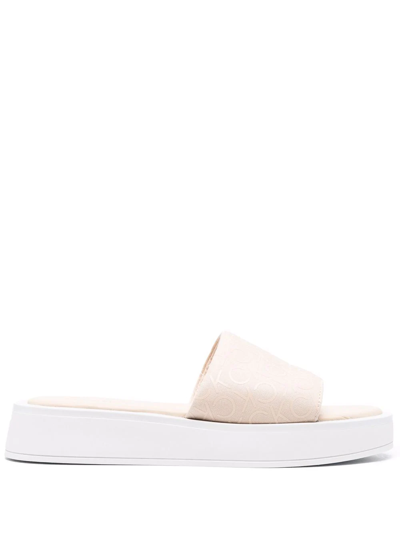 Calvin Klein Monogram-vamp Chunky Sole Slides In Nude