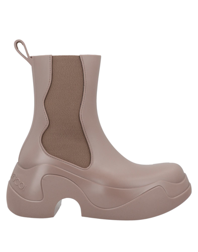 Xocoi Mid Rubber Ankle Boots In Beige