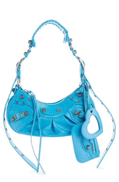 Balenciaga Cagole Xs Studded Crinkled-leather Shoulder Bag In Cyan