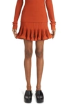 Givenchy Pleated A-line Stretch-knit Mini Skirt In 226-terracotta