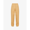 Stussy Stock Logo-print Tapered Cotton-jersey Jogging Bottoms In Tan