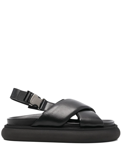 MONCLER CROSS-STRAP LEATHER SANDALS