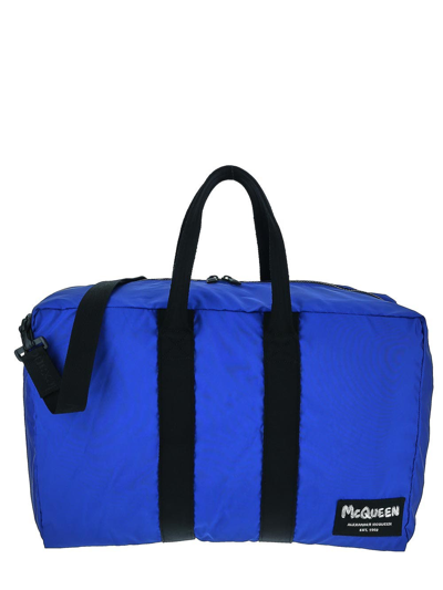 Alexander Mcqueen Logo Graffiti Duffle Bag In Blue