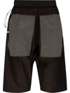 Arnar Mar Jonsson Hraun Contrast-pocket Relaxed Fit Shell Shorts In Black