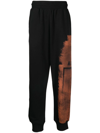 A-COLD-WALL* LOGO BLEACH STYLE TRACK PANTS