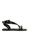 ALAÏA FLAT ANKLE STRAP SANDALS